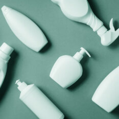 Variety of home care products, including cleaning bottles with spray nozzles, soap bottles, and more