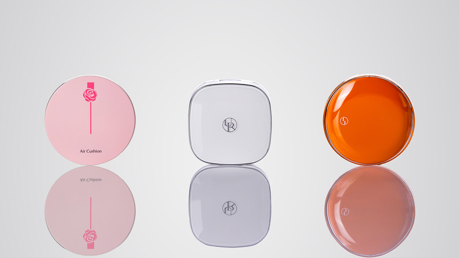 Vibrant custom-colored cosmetic packaging palettes with bold branding for makeup lines.