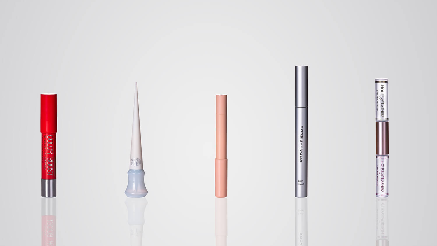 Lipstick and mascara pen packaging with customizable decoration for beauty brands.