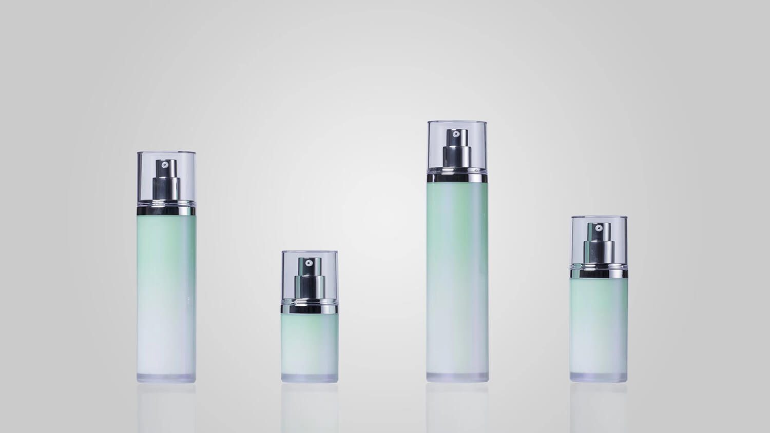 Ombre metallized airless bottles with gradient finish for premium skincare lines.