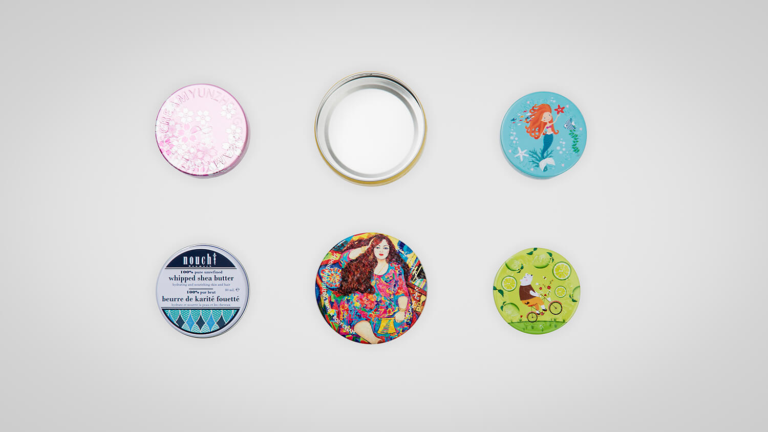 Aluminum jars featuring embossed logos and printed surface decoration.