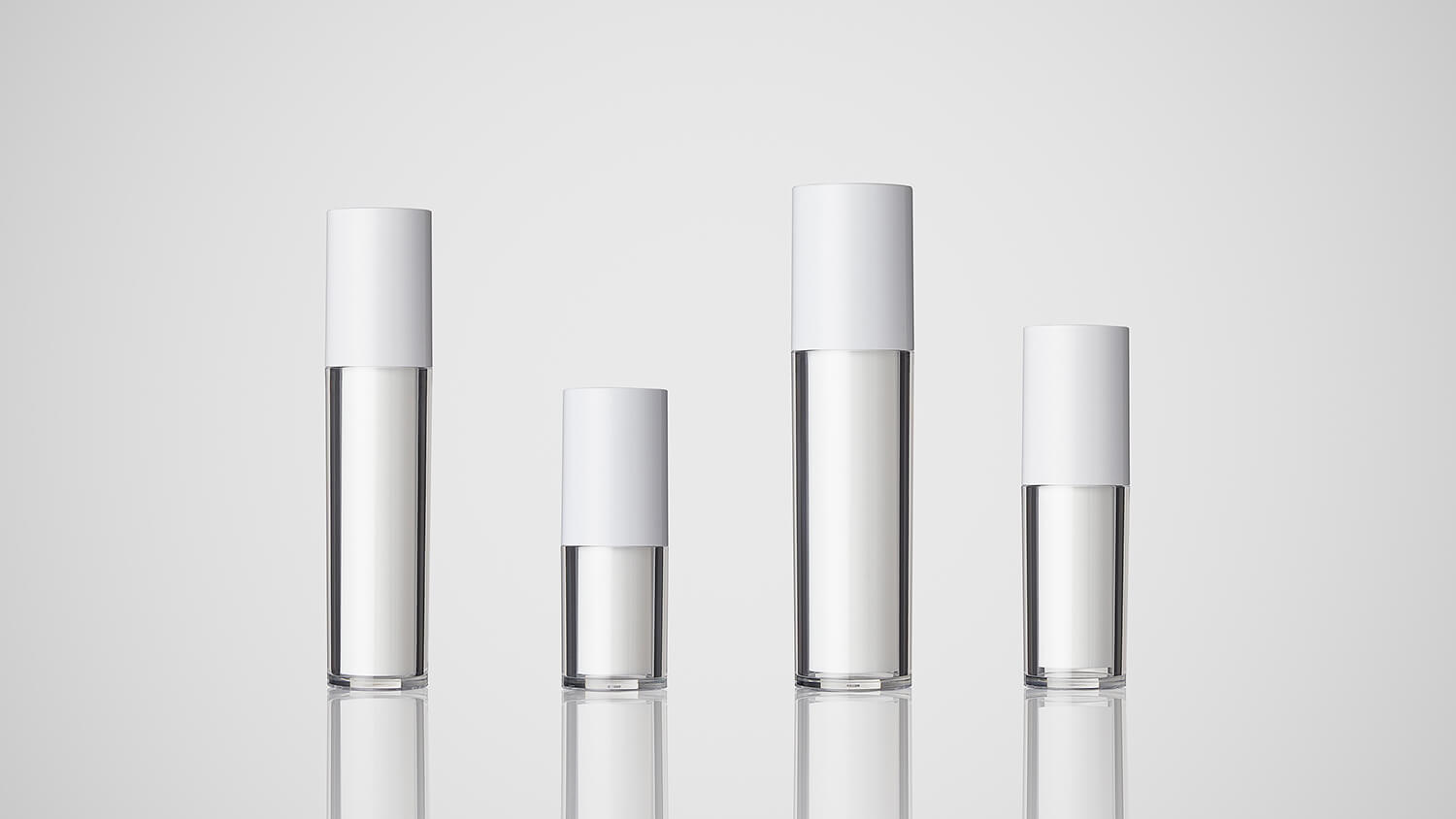 Refillable stick bottles with caps, available in different sizes and customizable.