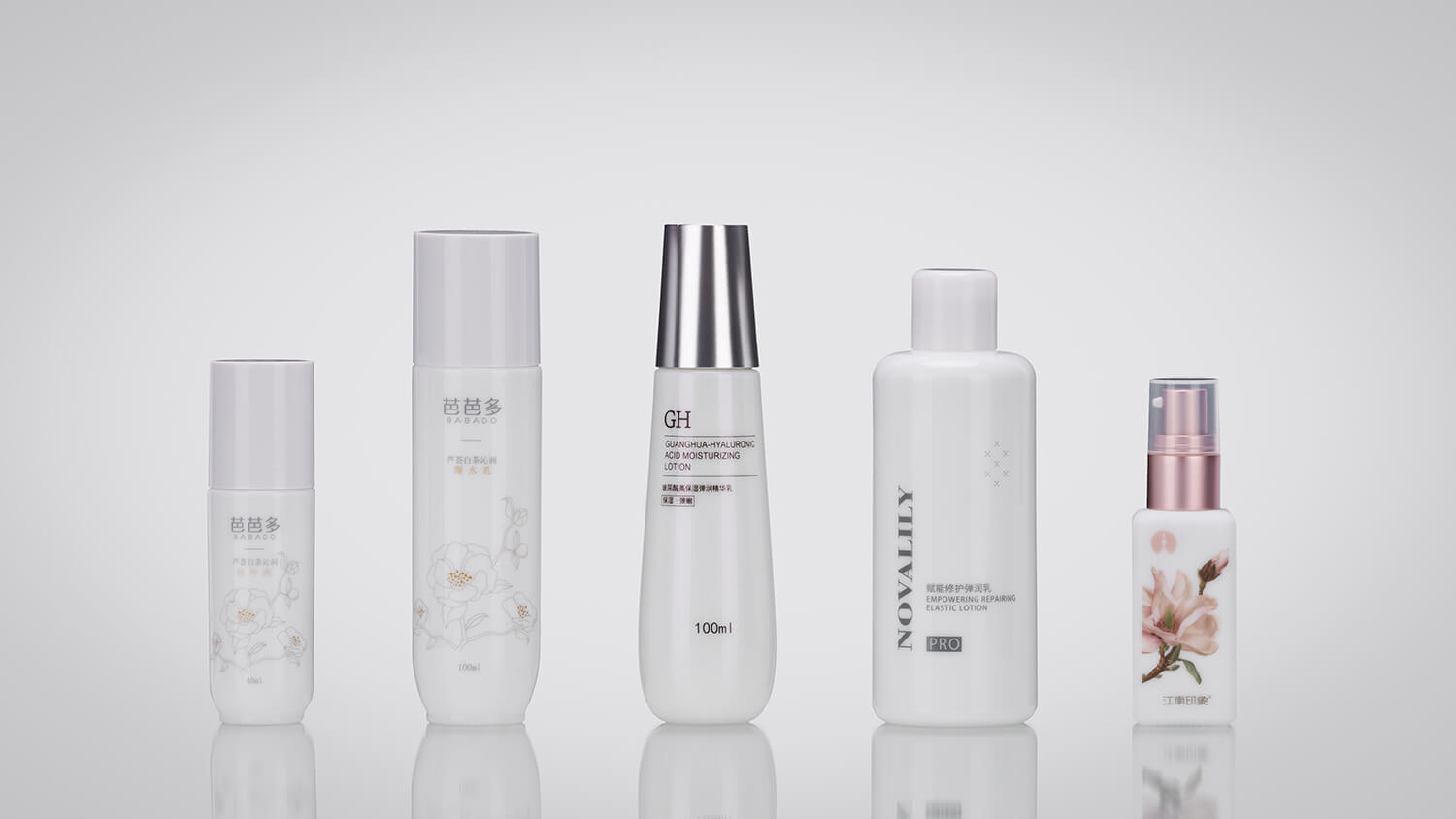 Lotion bottles with shimmering opal glass and custom branding.