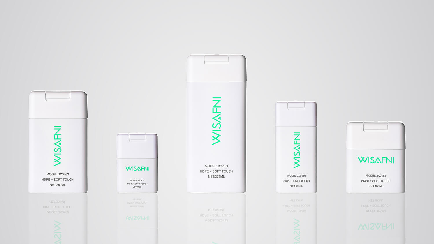 Square-shaped plastic bottles with soft-touch finishes in multiple sizes.