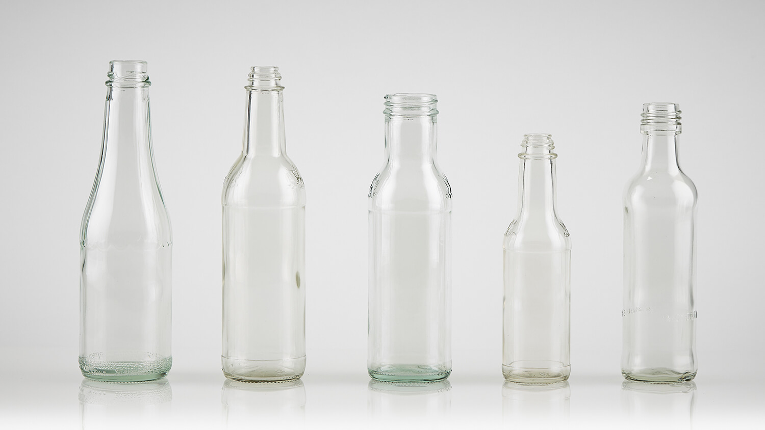 Stock, clear sauce bottles by Evergreen.