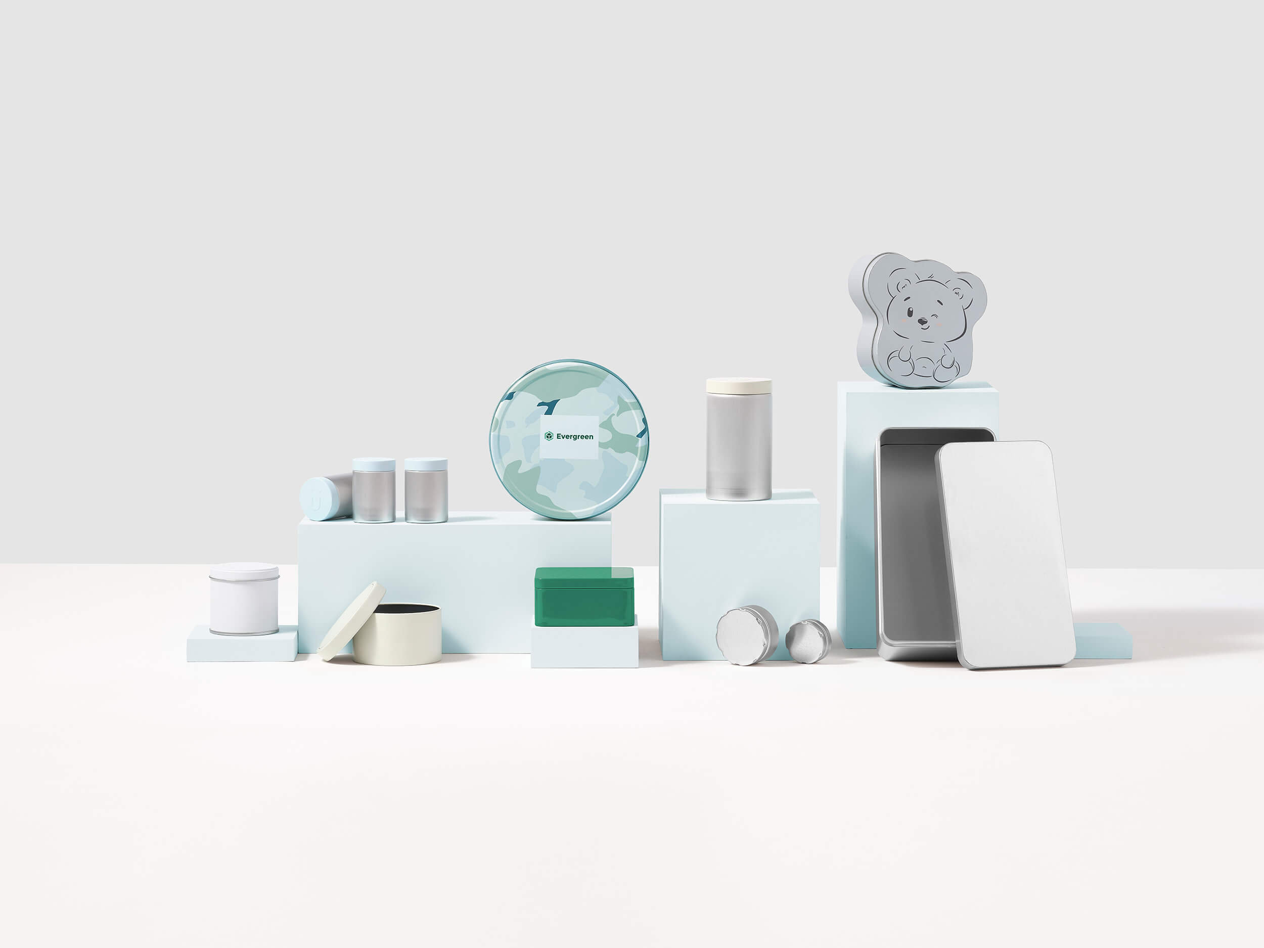 Plastic jars in a line, all different sizes and colors.