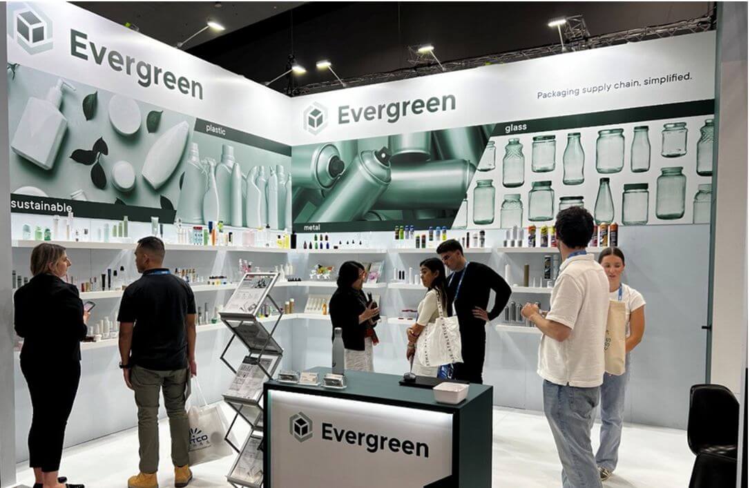 Evergreen team at Appex 2024, networking and showing their display to visitors.