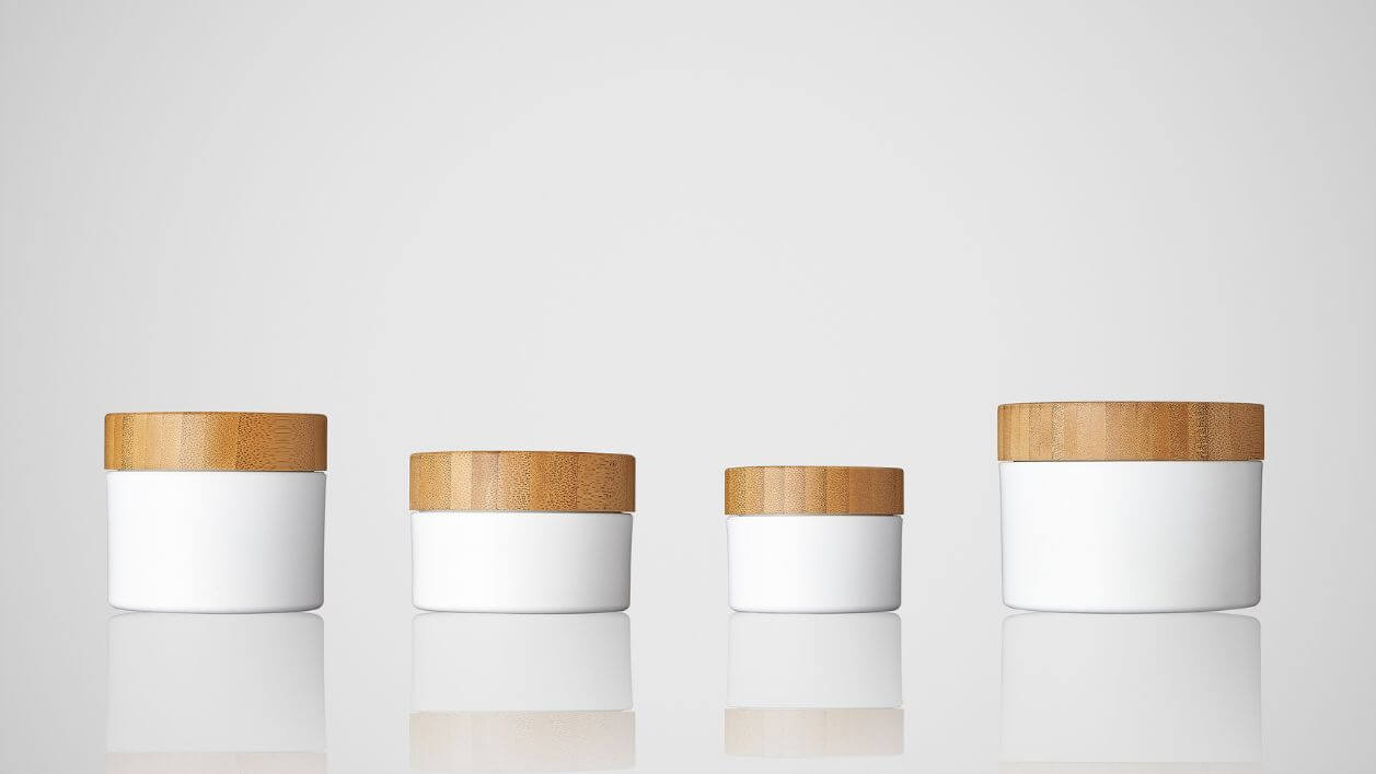 Eco-friendly bamboo–plastic jars designed for sustainable packaging.