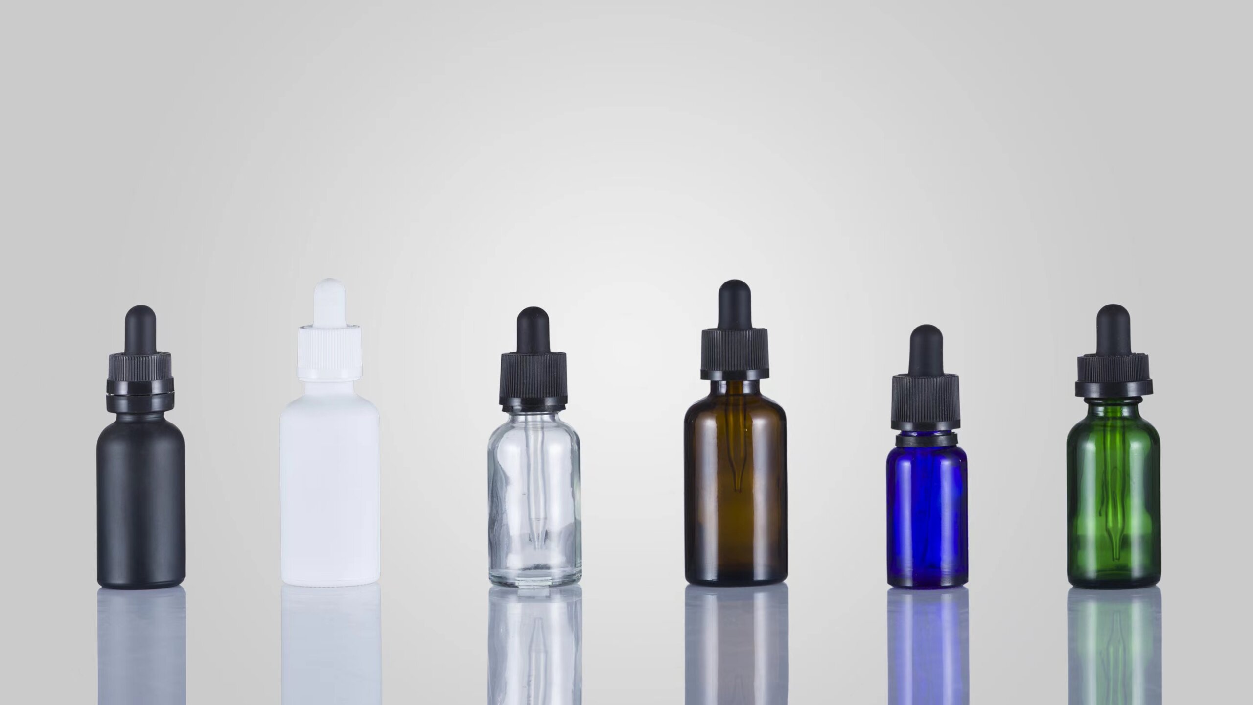 Child-resistant glass dropper bottles designed for secure, precise dispensing.