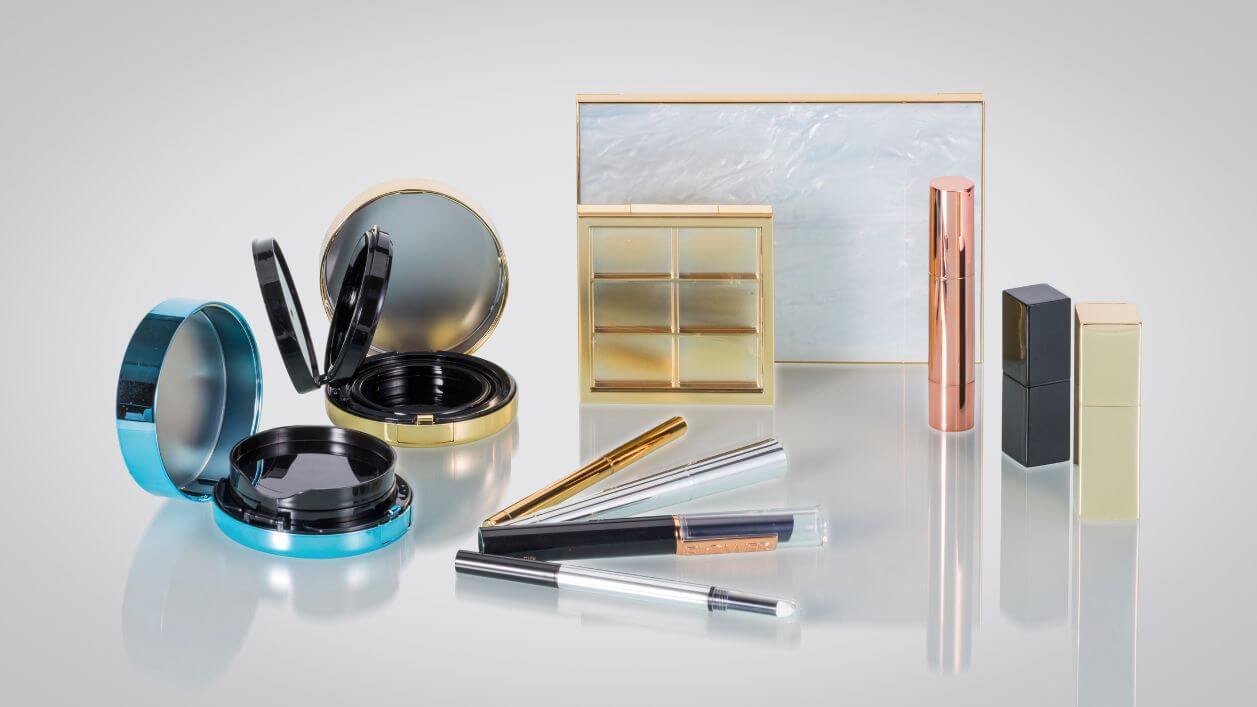 Variety of cosmetic compact packaging styles for powders, blushes, and other makeup products.