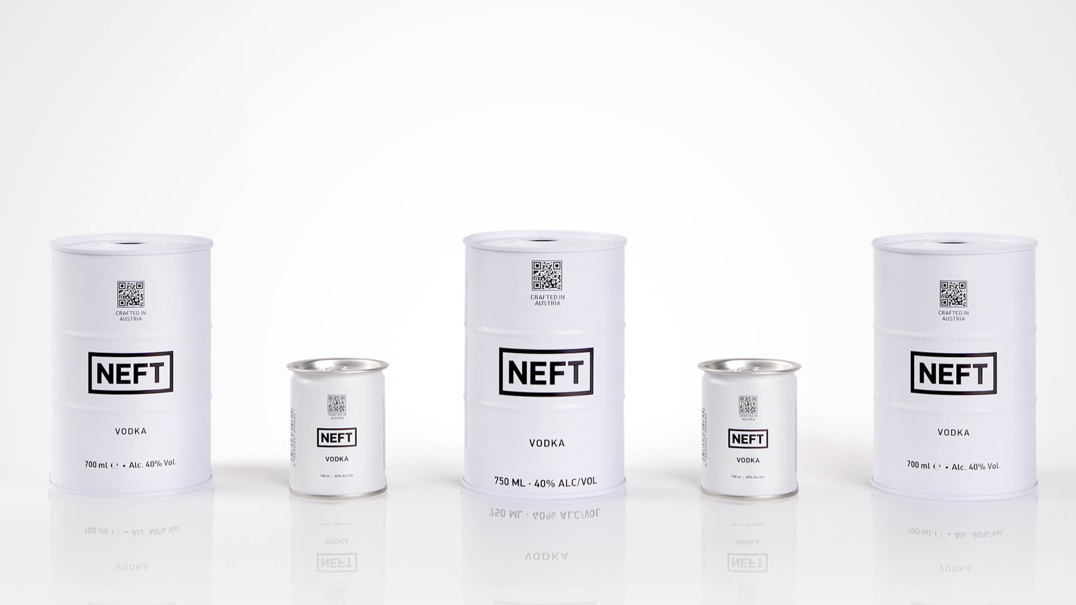 Food-grade metal cans featuring Neft designs for premium packaging.