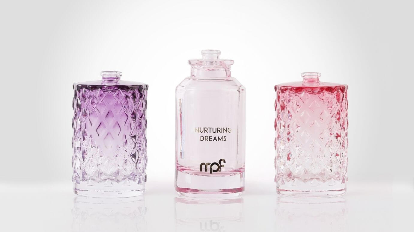 Branded perfume bottles with decorative colors and gradients.