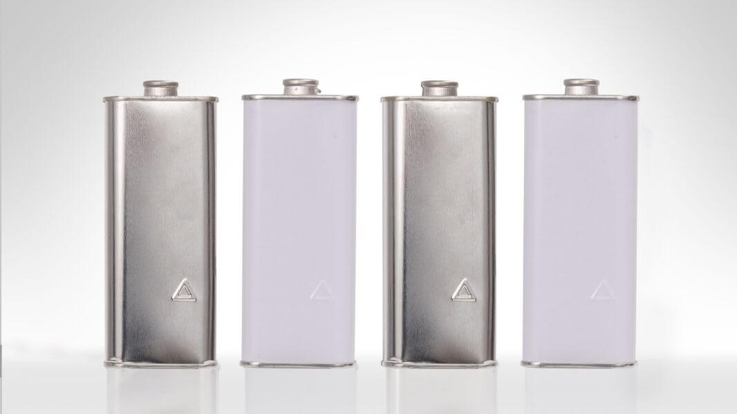 Stock chemical cans featuring molded logos for brand identity.