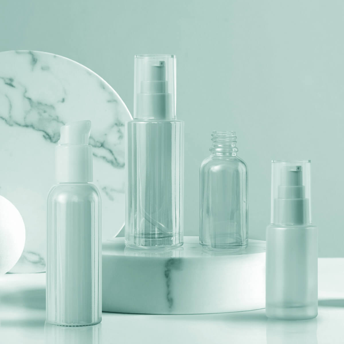 Optical coating bottles on display, with well-designed spray bottles.