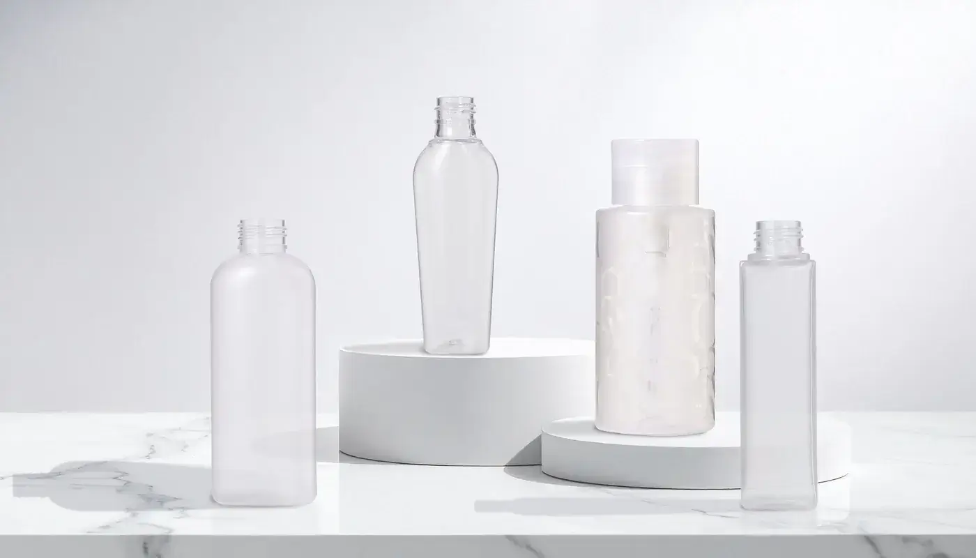 Plastic bottles with clean matte finishes by Evergreen.