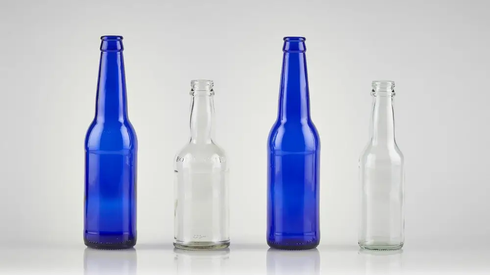 Beer bottle shape display, with 4 bottles of different shapes and colors.
