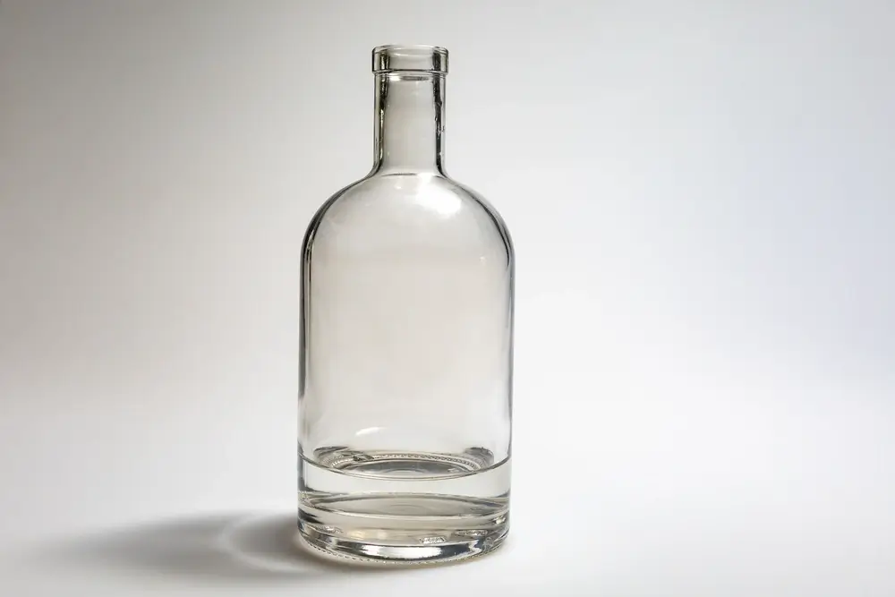 A clear Nordic spirits bottle, focusing on its shape.