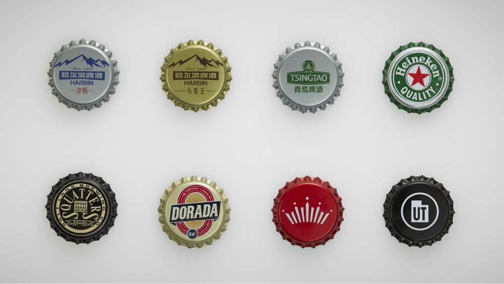 Crown caps by Evergreen, with logos and graphic design.