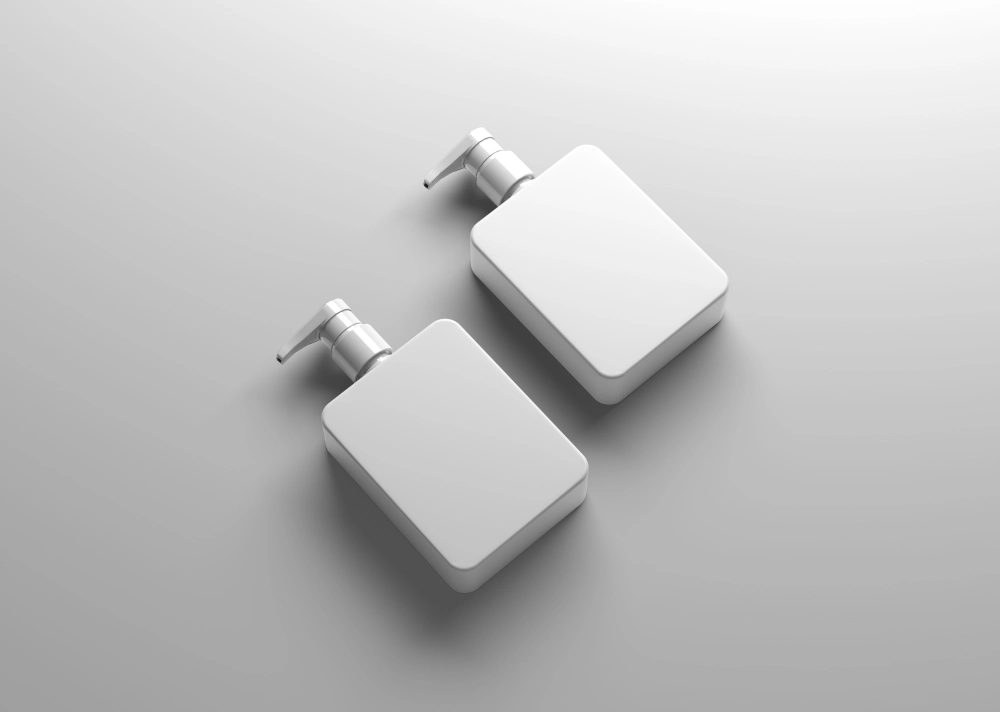 Lotion pumps on display, both squared shape with deep shadows.