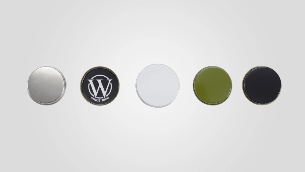 Metal continuous thread caps, colored, and with a logo.