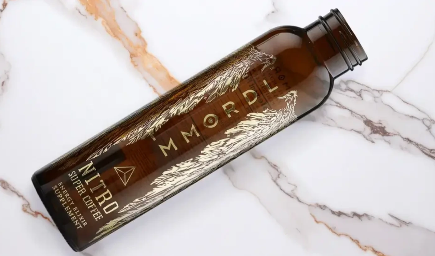 Decorated glass coffee bottle, with clean decorations and labeling.