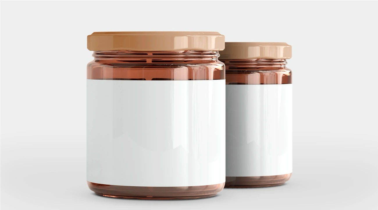 Glass jars with white labeling.