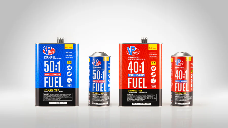 Metal fuel packaging in rectangular gallon cans and tall cylindrical quart cans, with blue 50:1 and red 40:1 printed labels and top dispensing closures.