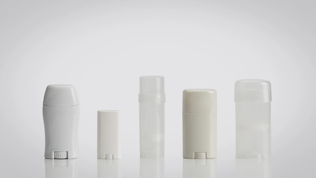 White sunscreen and deodorant stick containers in assorted round, oval, and cylindrical packaging formats.